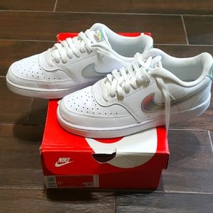 Nike white/silver iridescent,  8.5 women